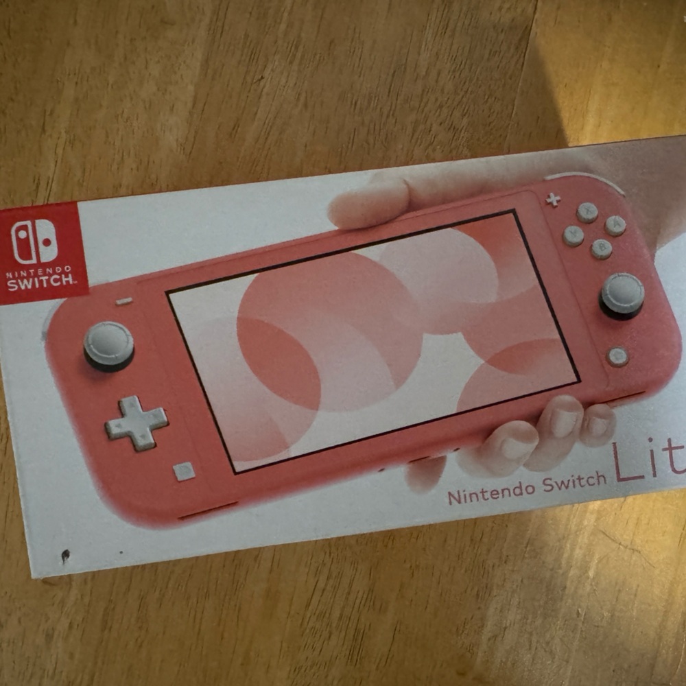 Nintendo switch lite/ Mario deluxe bundle